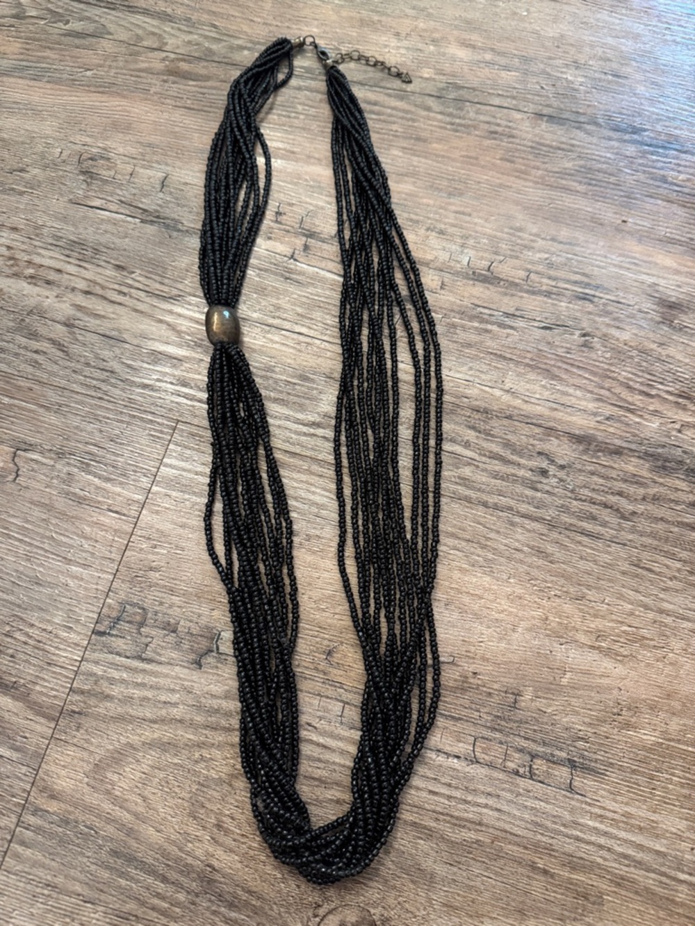 Layered Black Beaded Necklace with Gold Accent Bead